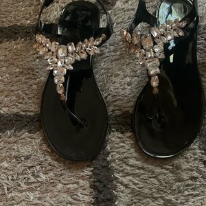 Black jeweled jelly sandals